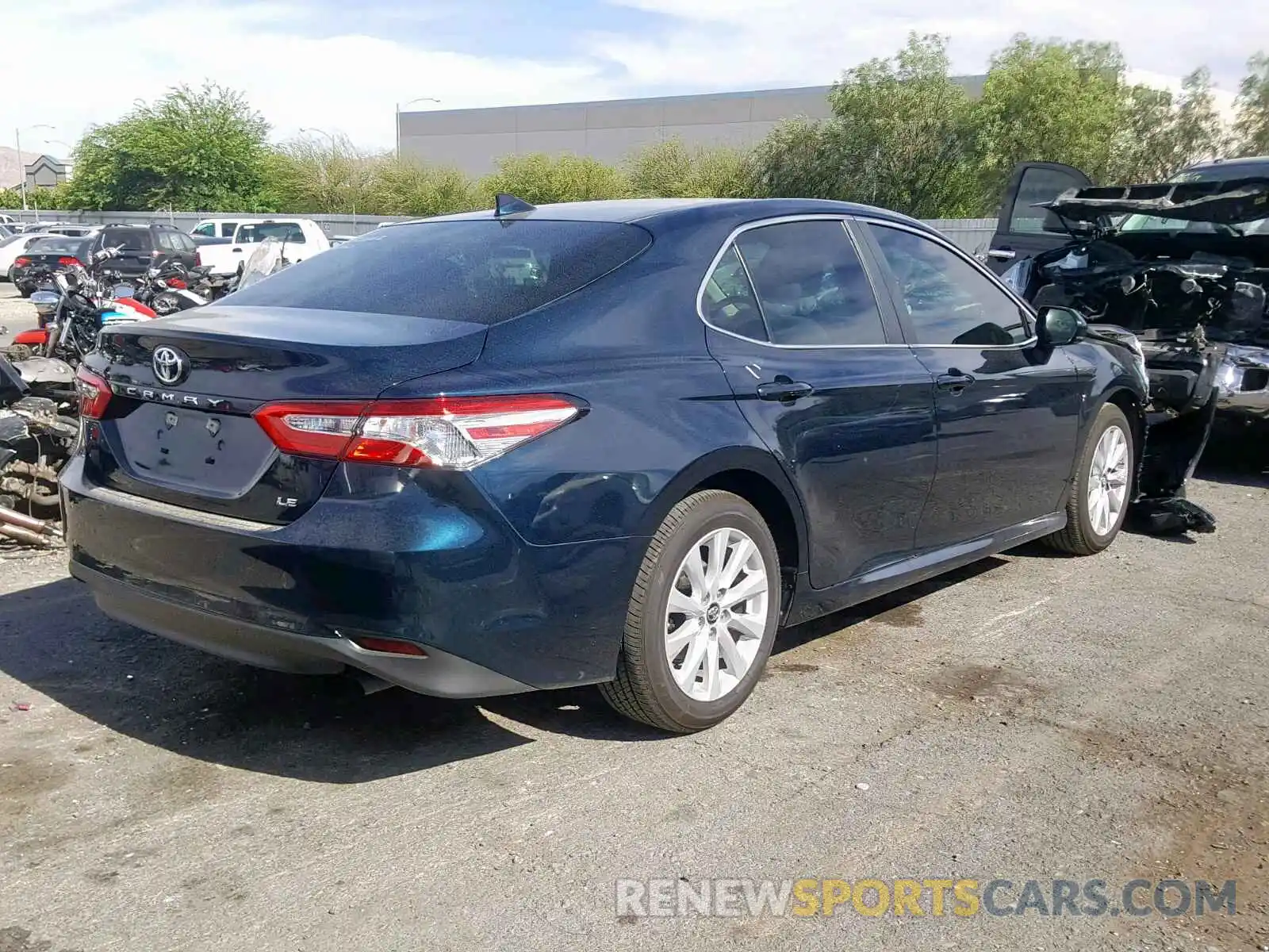 4 Photograph of a damaged car 4T1B11HK9KU721815 TOYOTA CAMRY 2019