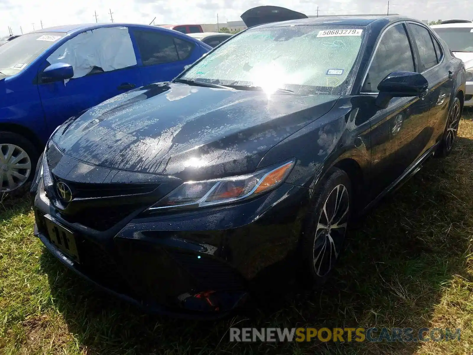 2 Photograph of a damaged car 4T1B11HK9KU723225 TOYOTA CAMRY 2019