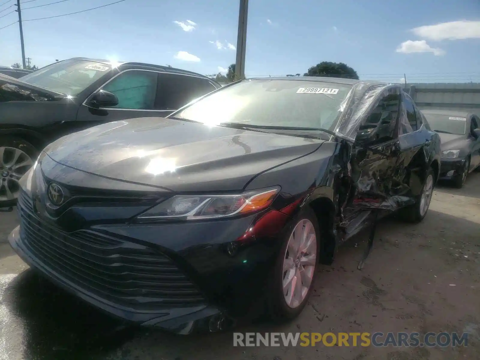 2 Photograph of a damaged car 4T1B11HK9KU724360 TOYOTA CAMRY 2019