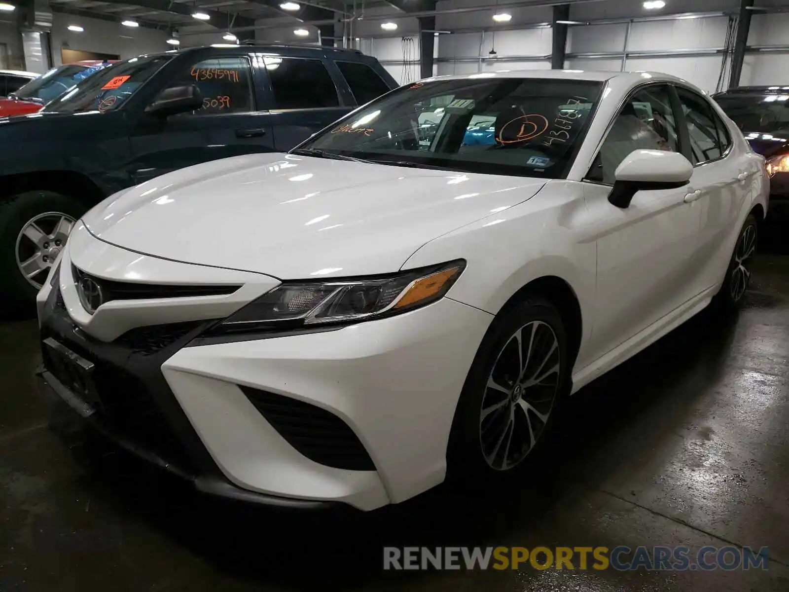 2 Photograph of a damaged car 4T1B11HK9KU729686 TOYOTA CAMRY 2019