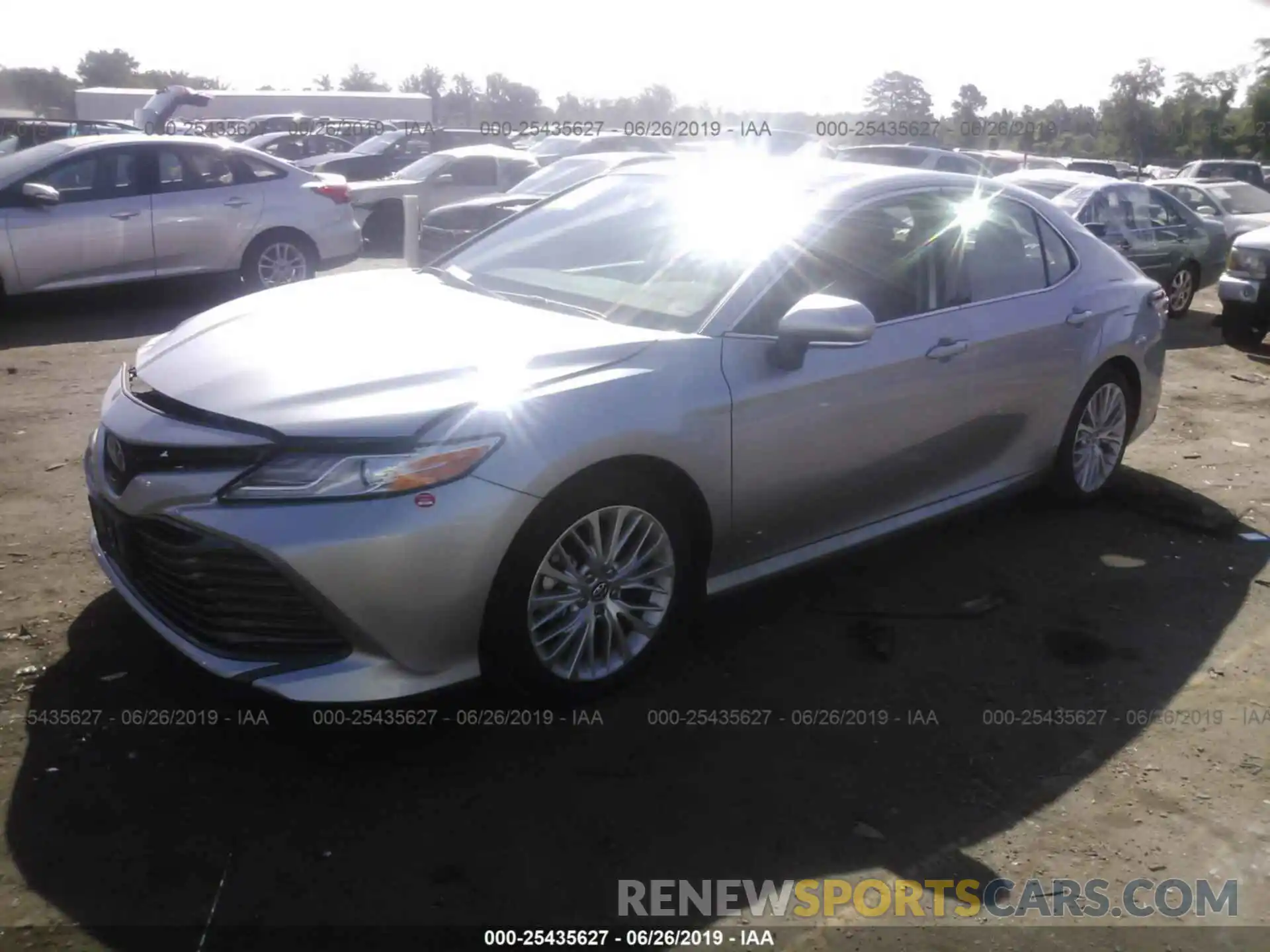 2 Photograph of a damaged car 4T1B11HK9KU733950 TOYOTA CAMRY 2019