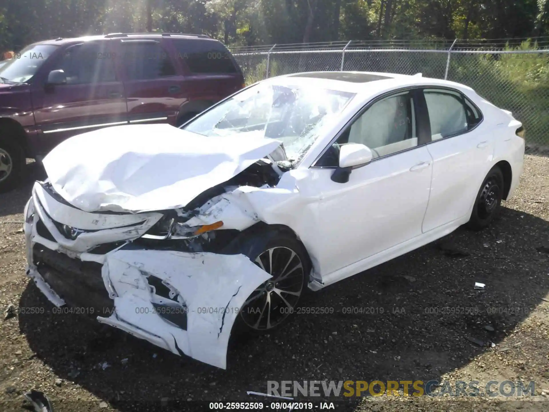 2 Photograph of a damaged car 4T1B11HK9KU736203 TOYOTA CAMRY 2019