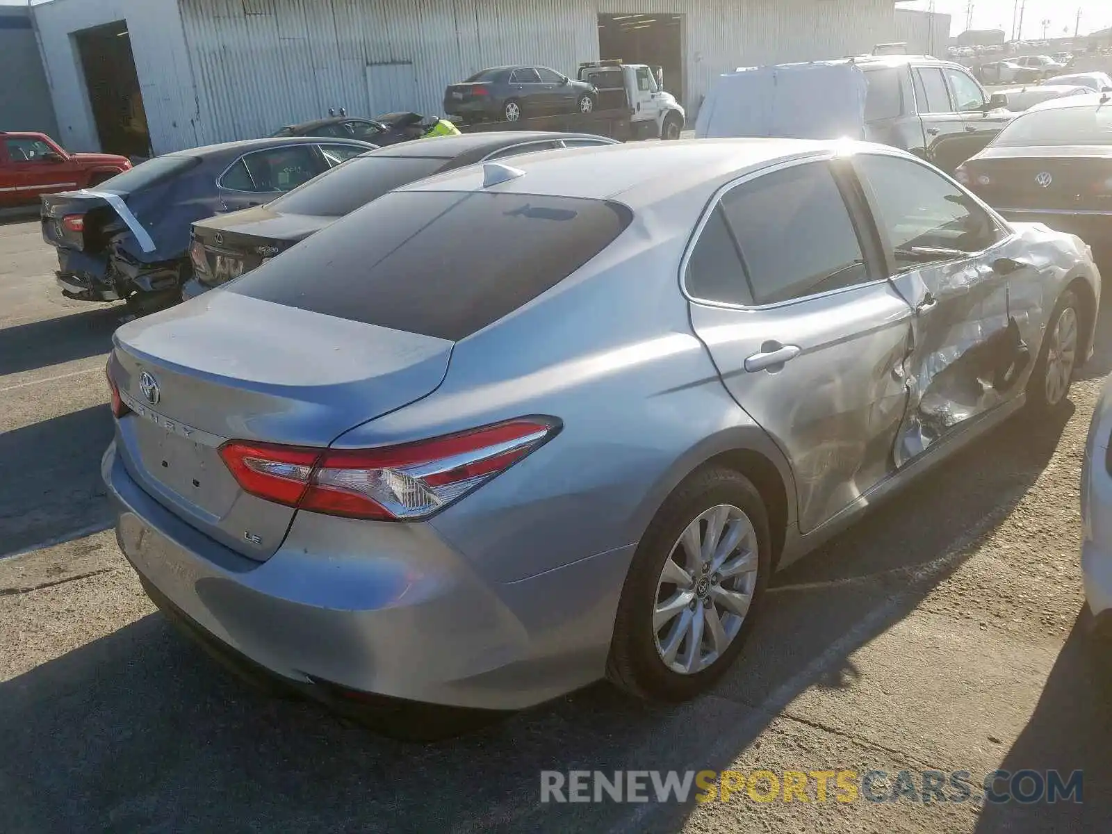 4 Photograph of a damaged car 4T1B11HK9KU738713 TOYOTA CAMRY 2019