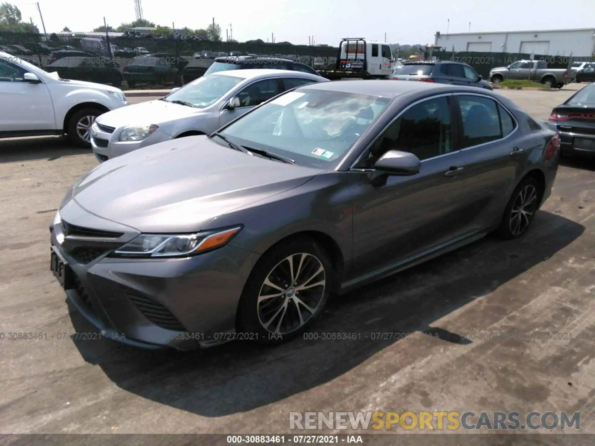 2 Photograph of a damaged car 4T1B11HK9KU740977 TOYOTA CAMRY 2019