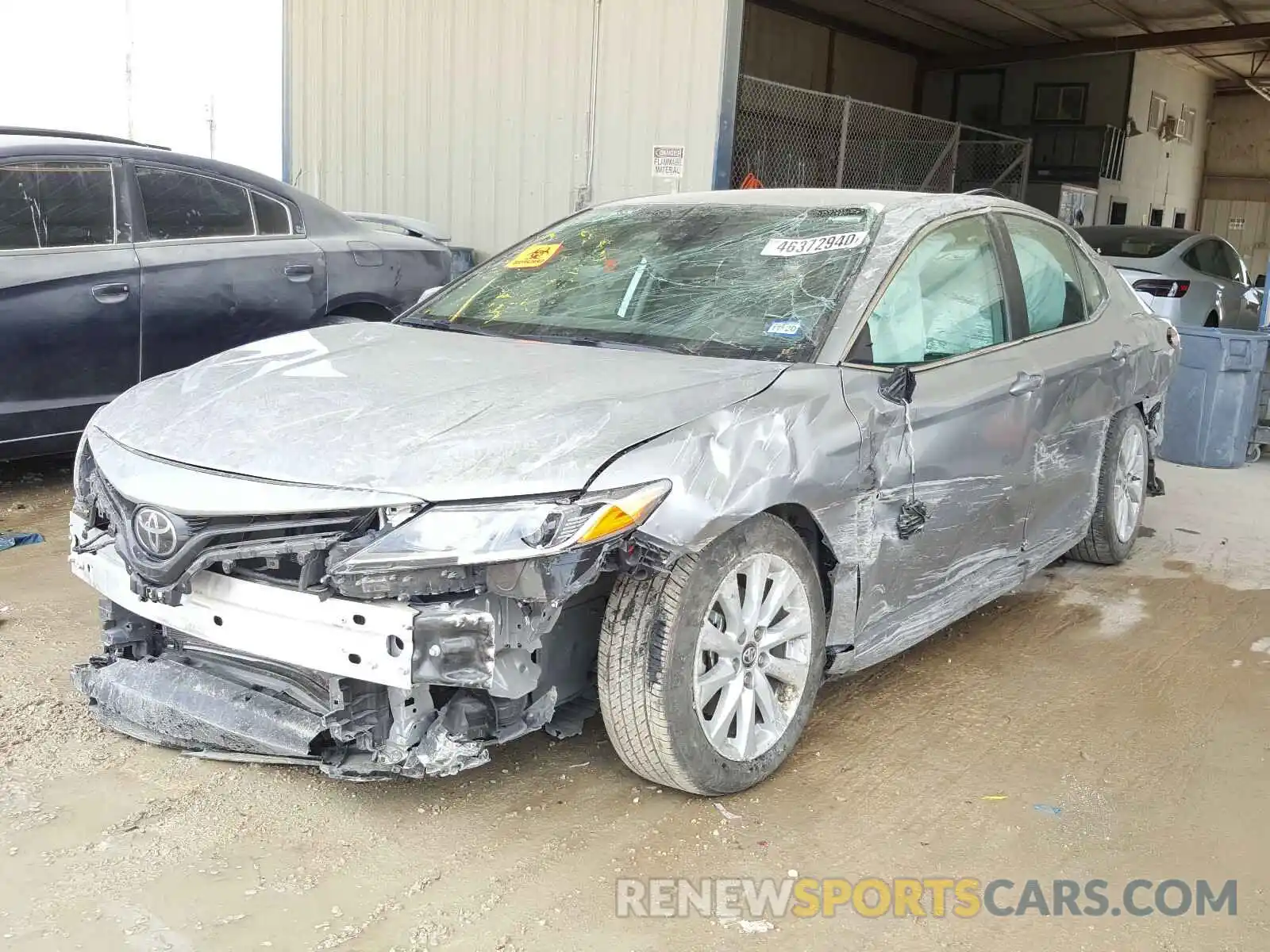 2 Photograph of a damaged car 4T1B11HK9KU741028 TOYOTA CAMRY 2019