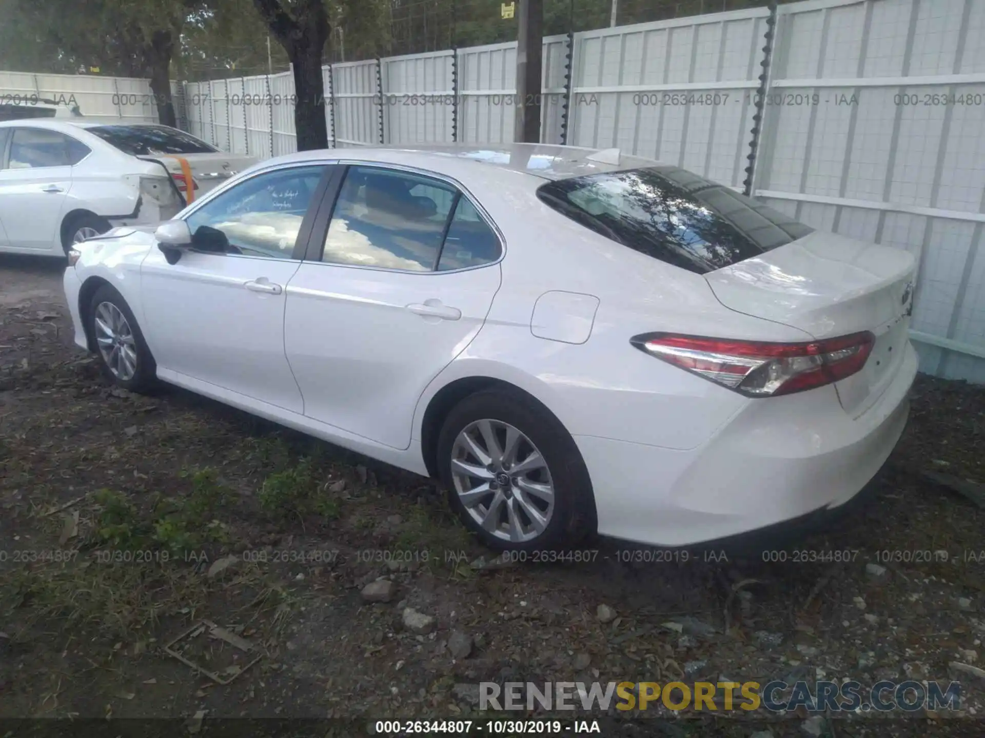 3 Photograph of a damaged car 4T1B11HK9KU745323 TOYOTA CAMRY 2019