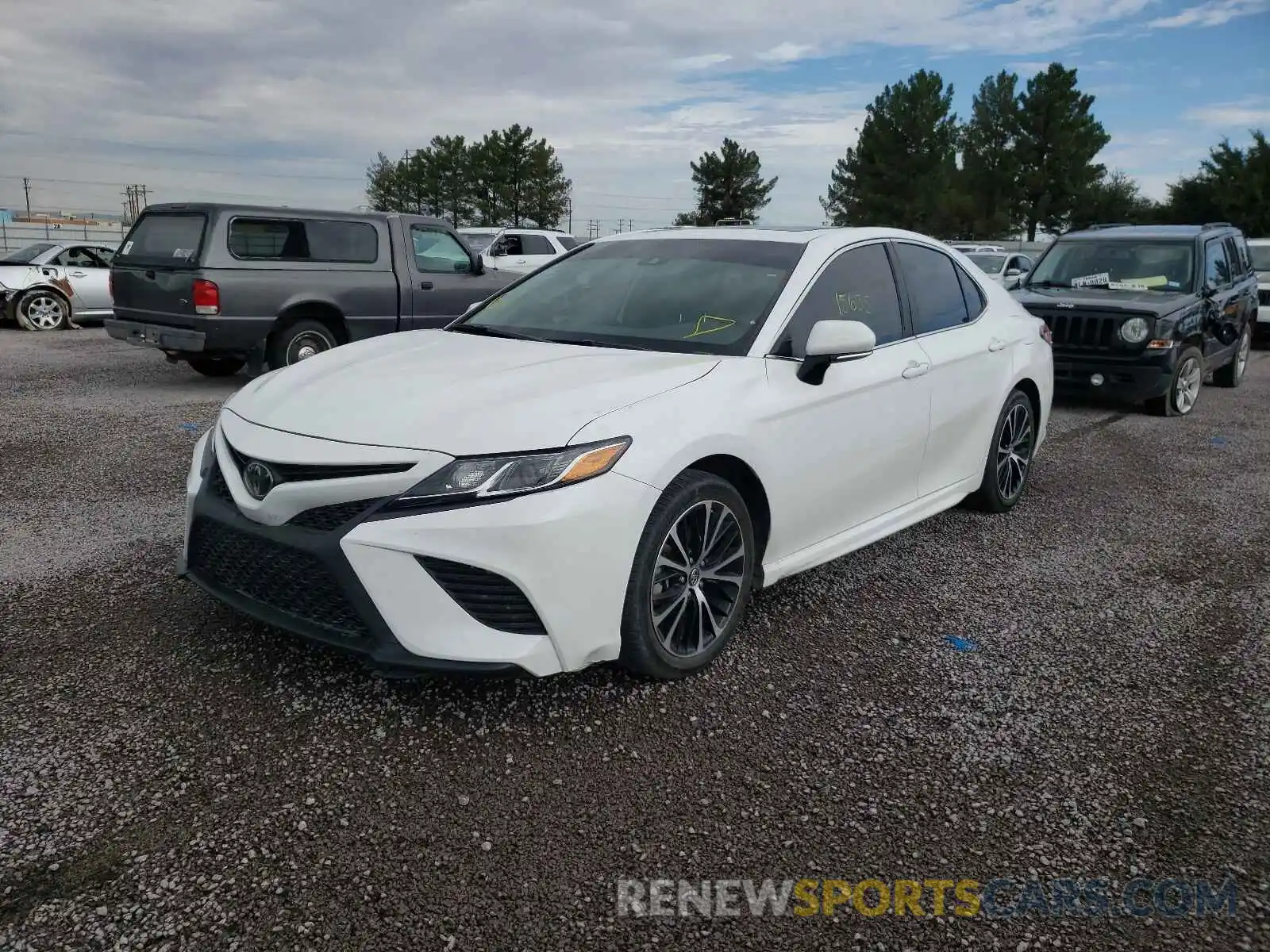 2 Photograph of a damaged car 4T1B11HK9KU751865 TOYOTA CAMRY 2019