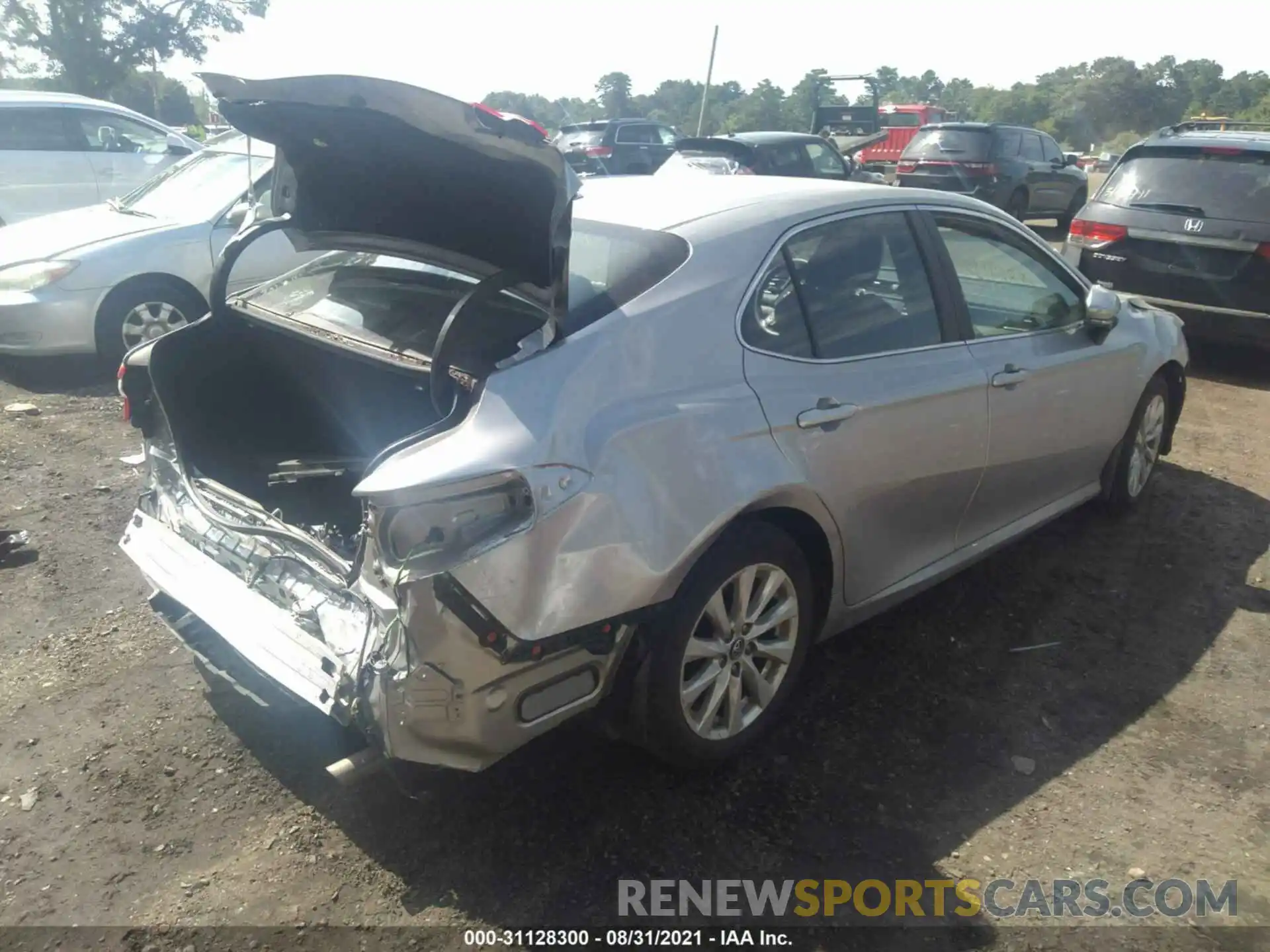 4 Photograph of a damaged car 4T1B11HK9KU752658 TOYOTA CAMRY 2019