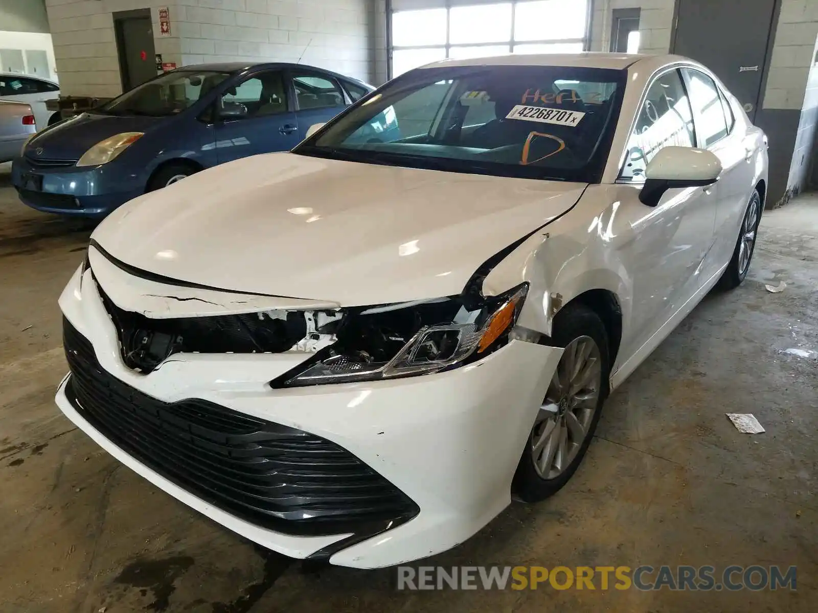 2 Photograph of a damaged car 4T1B11HK9KU753454 TOYOTA CAMRY 2019