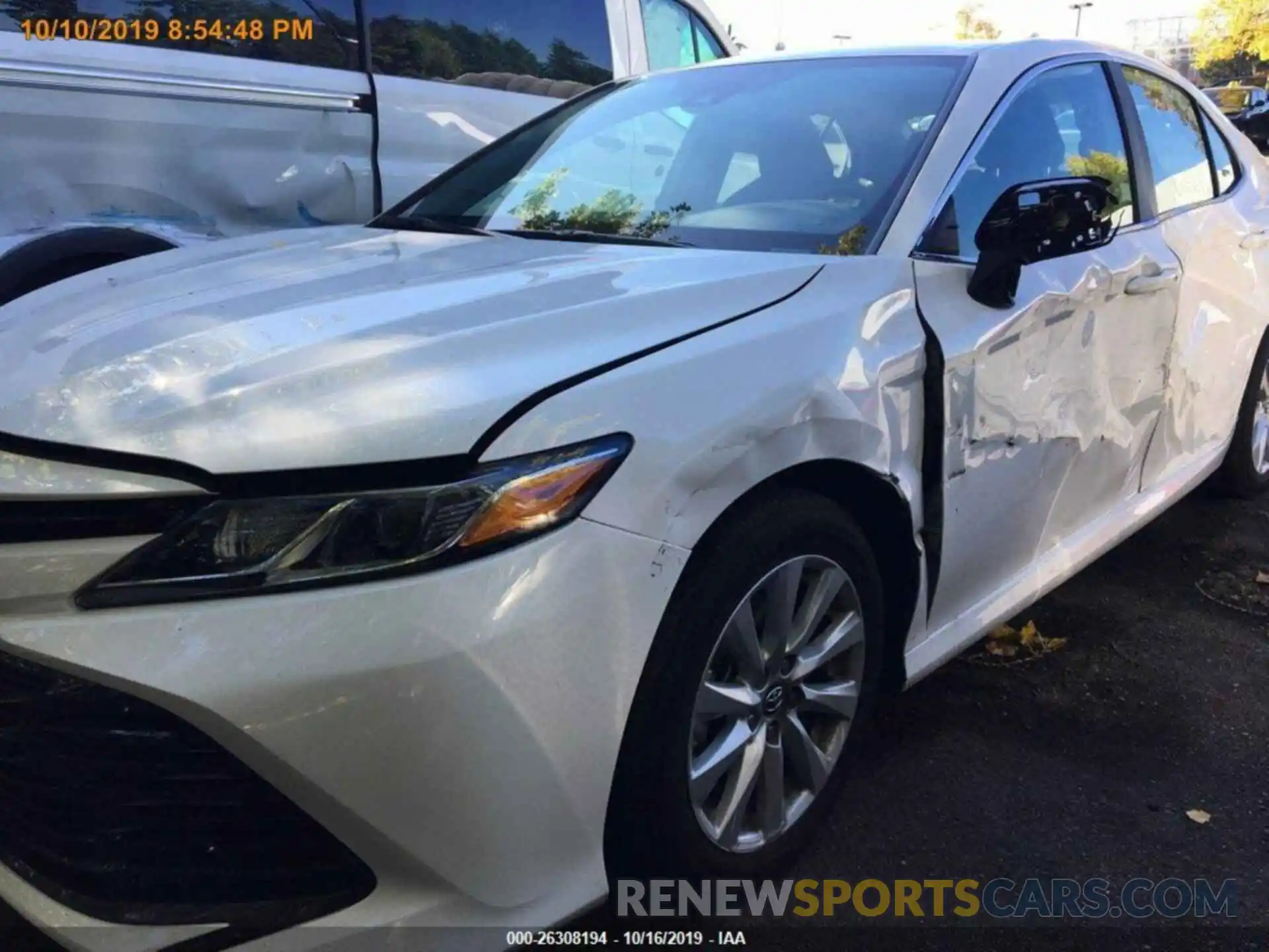 12 Photograph of a damaged car 4T1B11HK9KU754944 TOYOTA CAMRY 2019