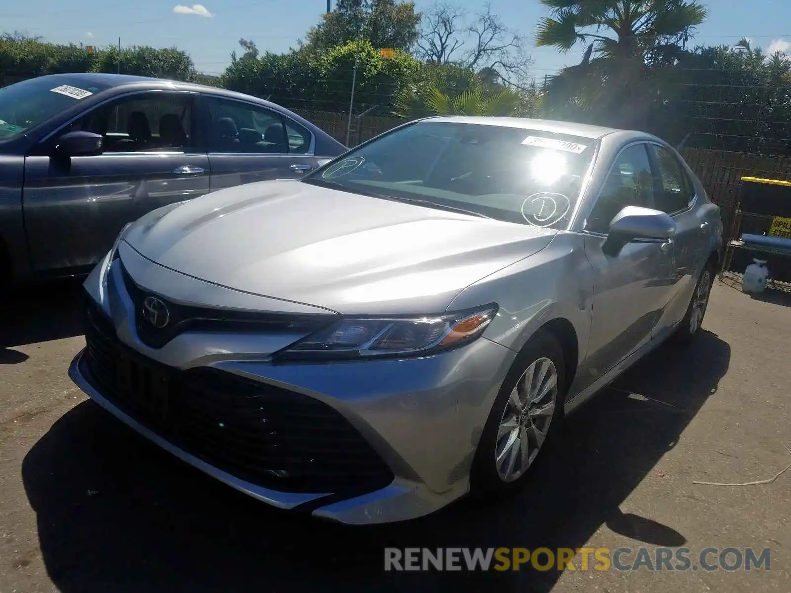 2 Photograph of a damaged car 4T1B11HK9KU762297 TOYOTA CAMRY 2019