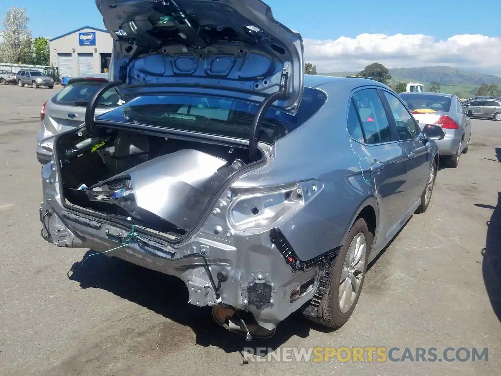 4 Photograph of a damaged car 4T1B11HK9KU762297 TOYOTA CAMRY 2019