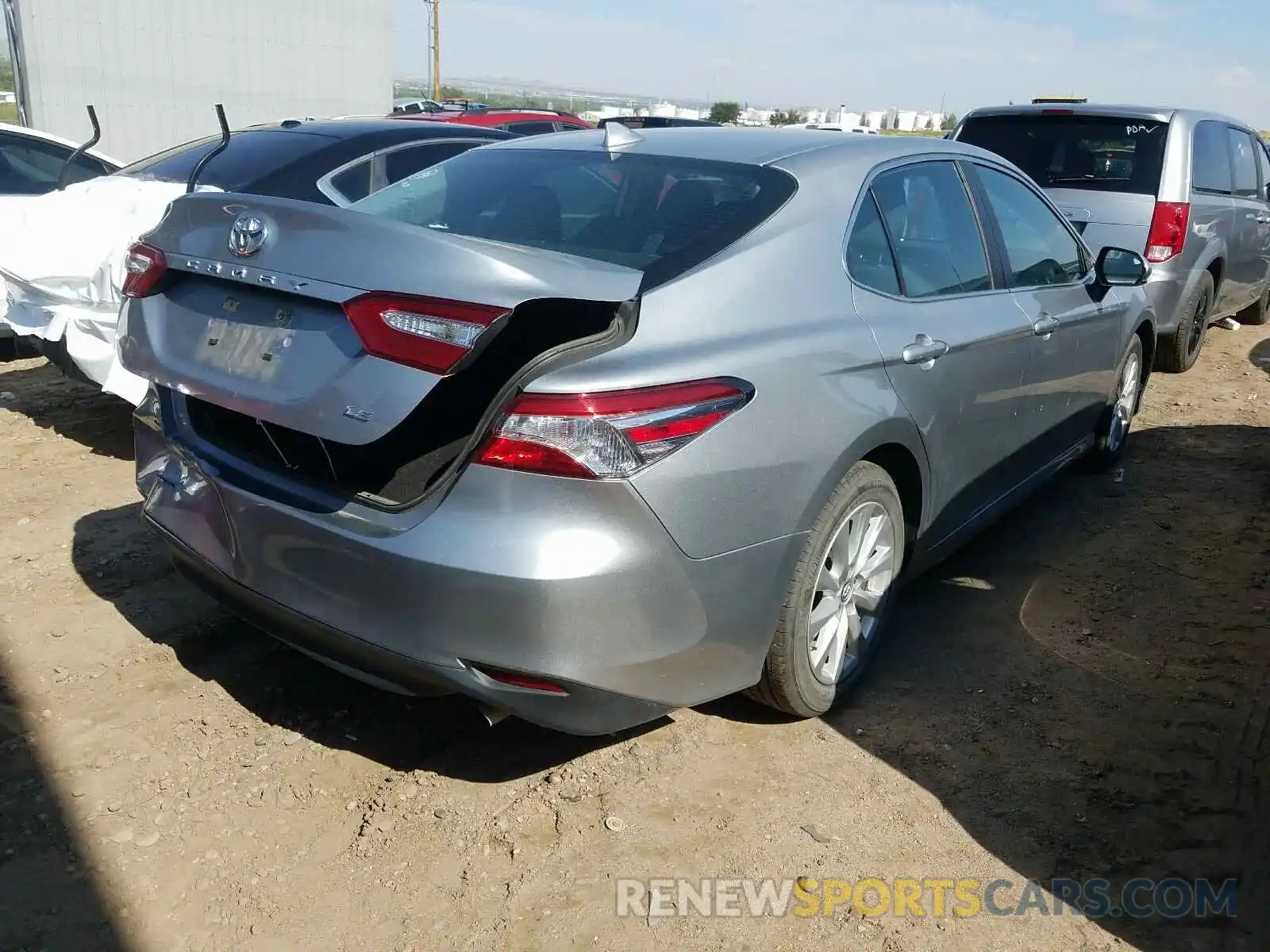 4 Photograph of a damaged car 4T1B11HK9KU770772 TOYOTA CAMRY 2019