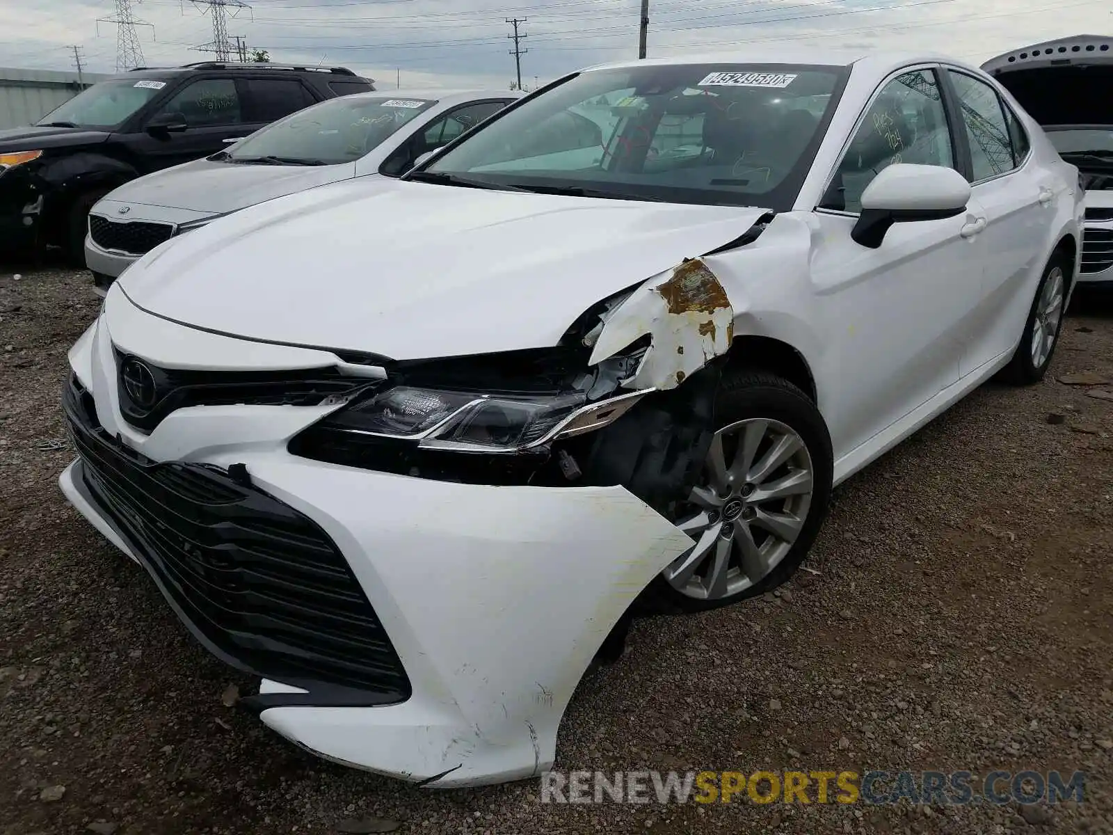 2 Photograph of a damaged car 4T1B11HK9KU775194 TOYOTA CAMRY 2019