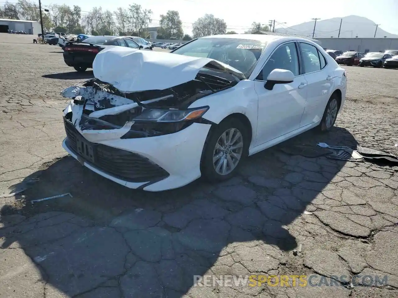 2 Photograph of a damaged car 4T1B11HK9KU778791 TOYOTA CAMRY 2019