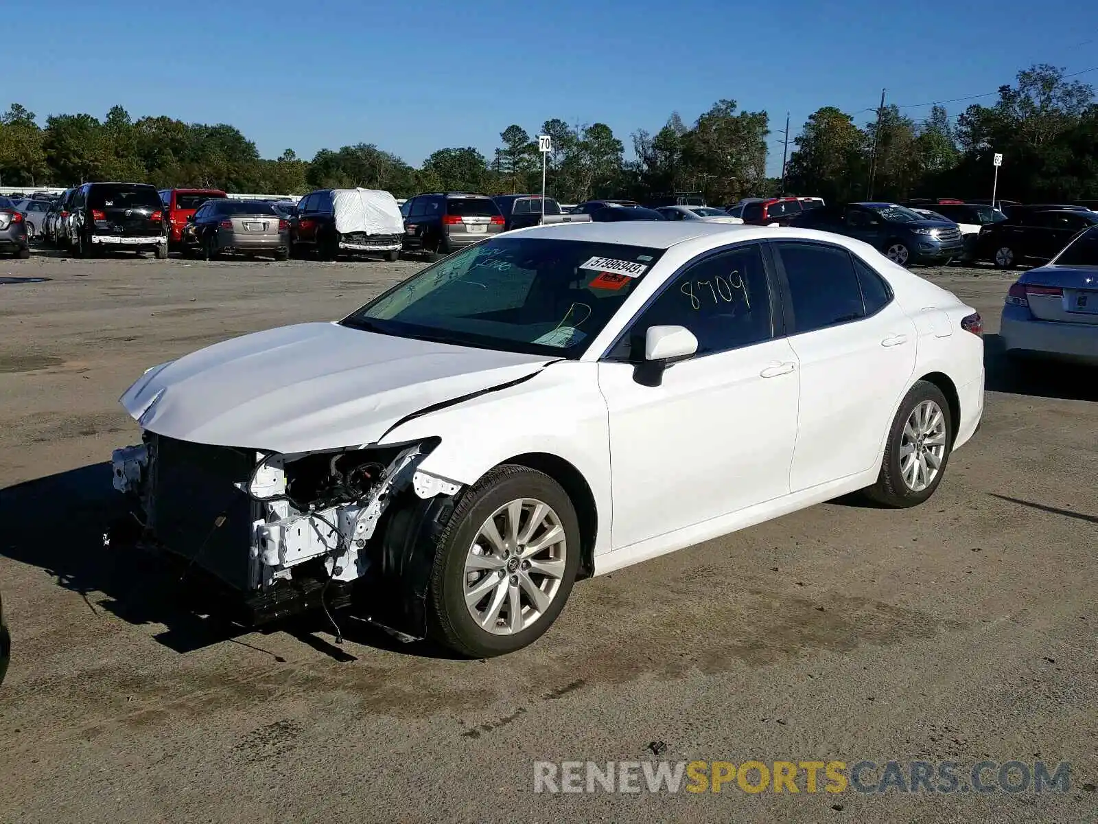 2 Photograph of a damaged car 4T1B11HK9KU787474 TOYOTA CAMRY 2019