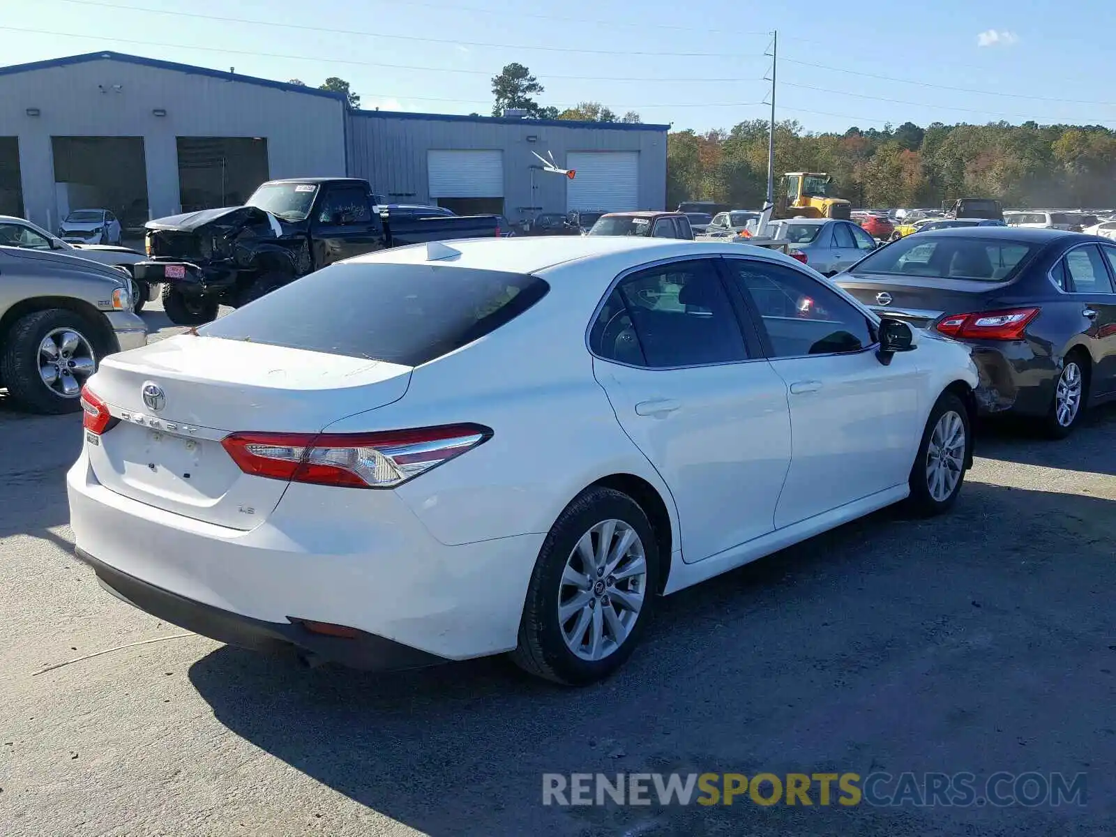 4 Photograph of a damaged car 4T1B11HK9KU787474 TOYOTA CAMRY 2019