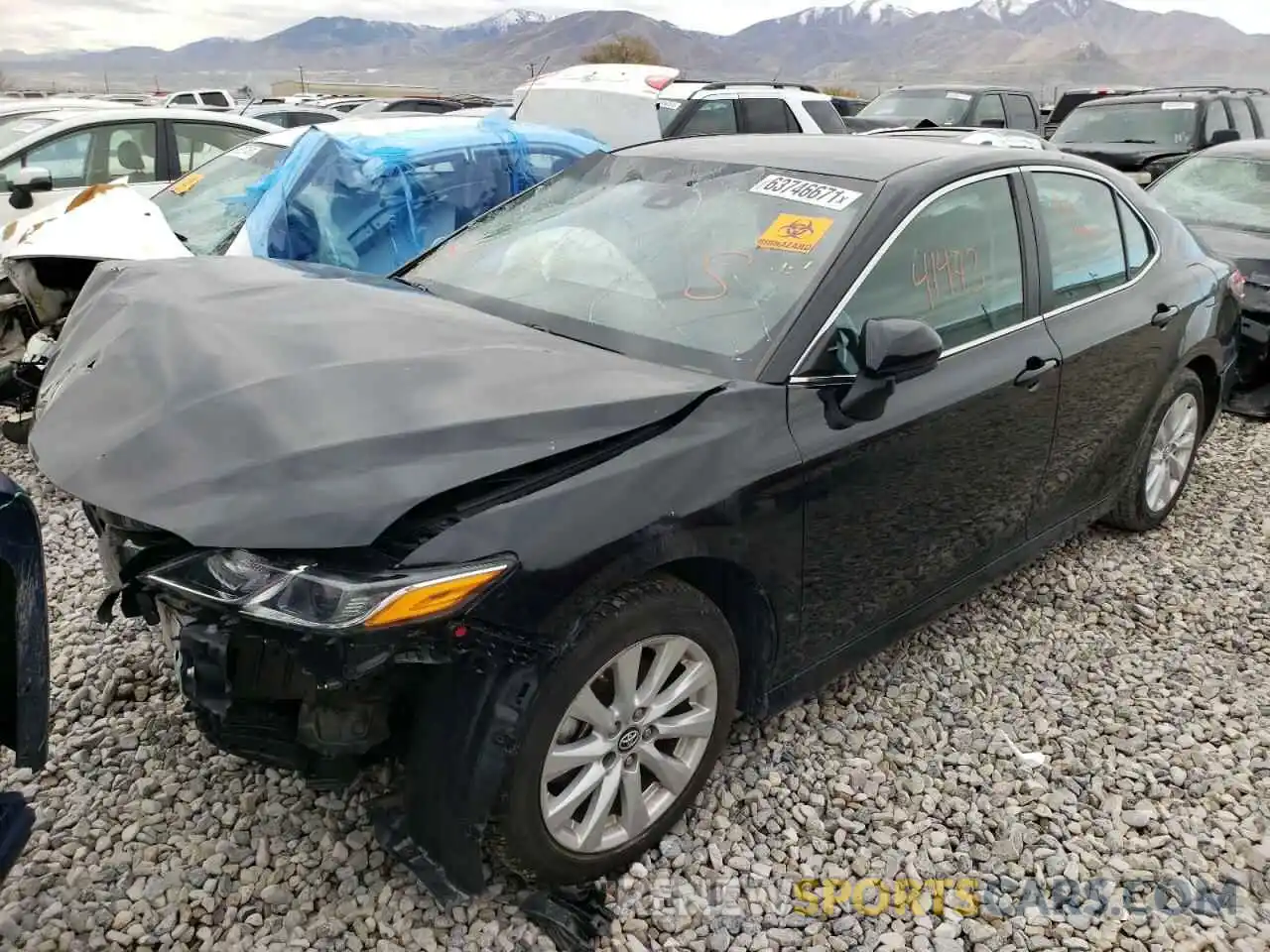 2 Photograph of a damaged car 4T1B11HK9KU787653 TOYOTA CAMRY 2019