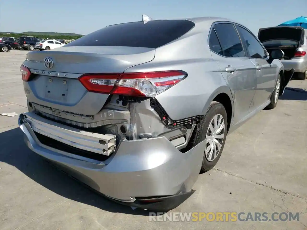 4 Photograph of a damaged car 4T1B11HK9KU788785 TOYOTA CAMRY 2019