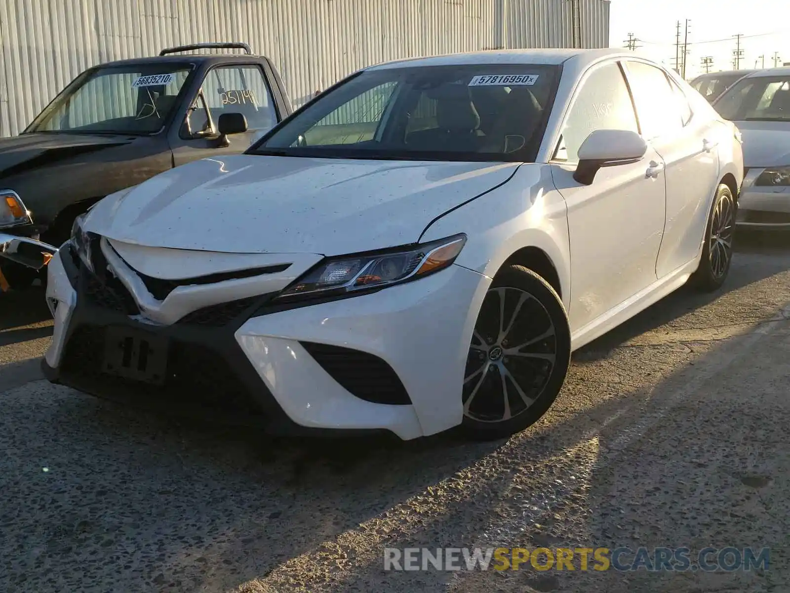 2 Photograph of a damaged car 4T1B11HK9KU789144 TOYOTA CAMRY 2019