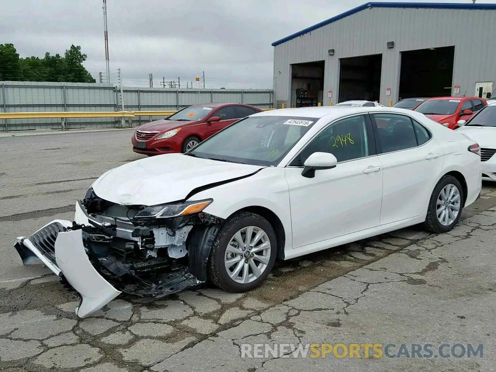 2 Photograph of a damaged car 4T1B11HK9KU793307 TOYOTA CAMRY 2019