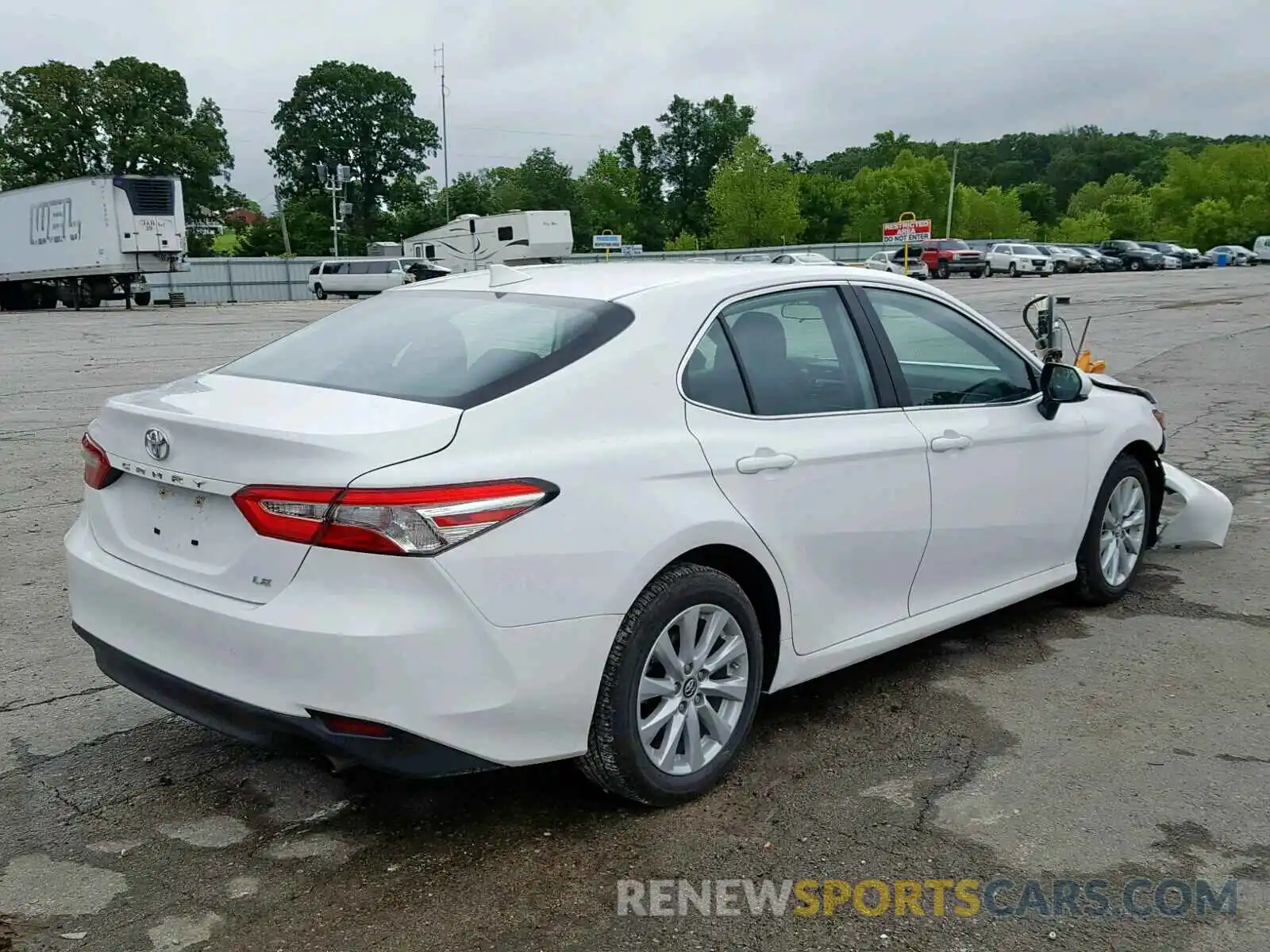 4 Photograph of a damaged car 4T1B11HK9KU793307 TOYOTA CAMRY 2019