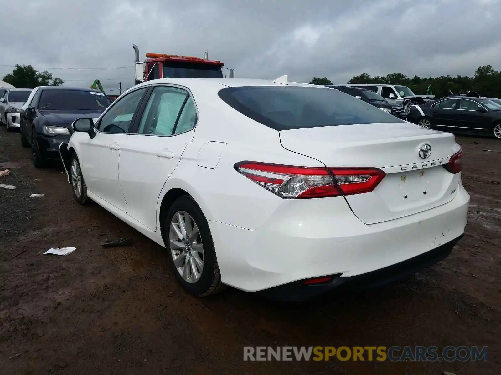 3 Photograph of a damaged car 4T1B11HK9KU800272 TOYOTA CAMRY 2019