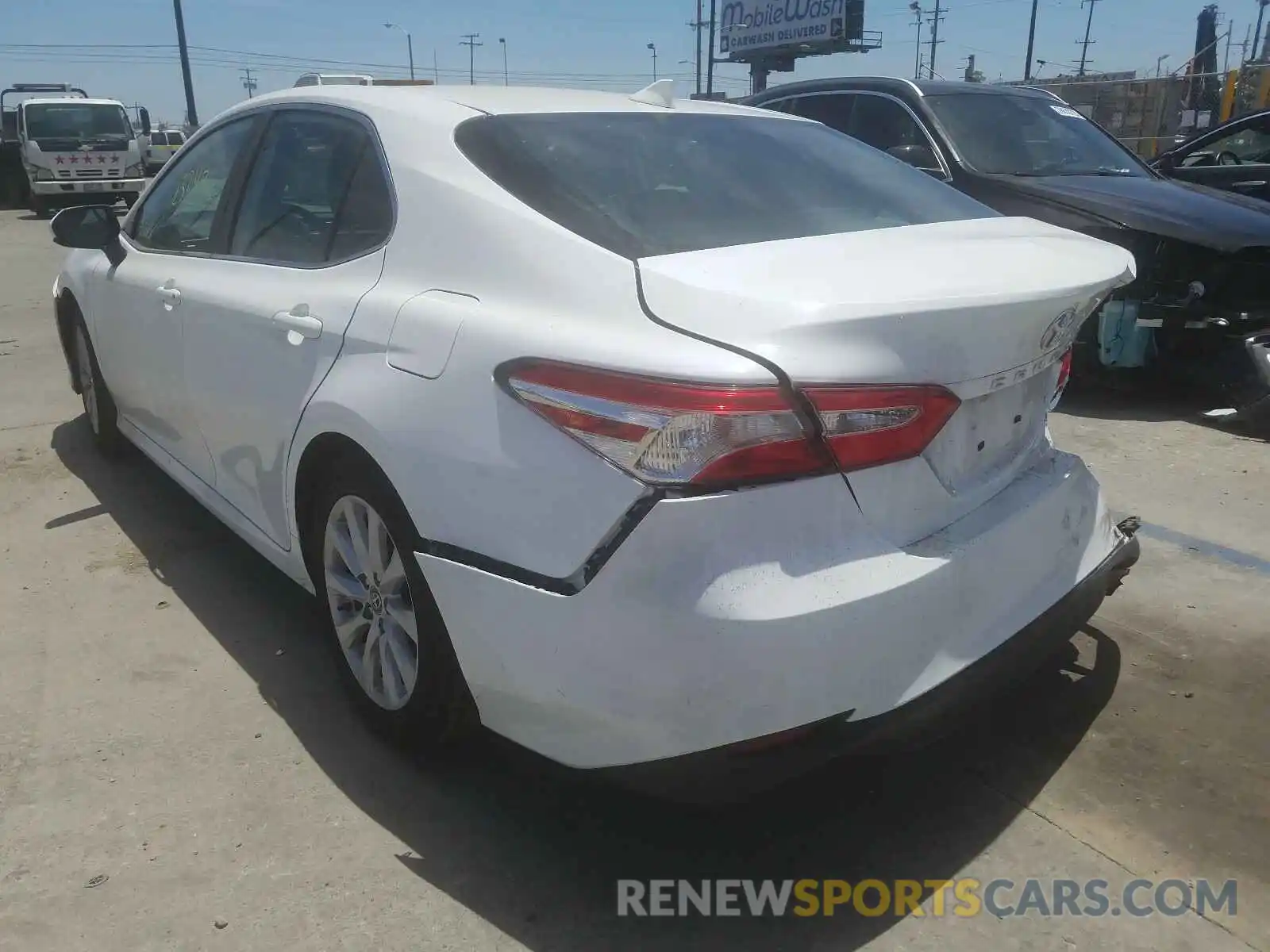 3 Photograph of a damaged car 4T1B11HK9KU801048 TOYOTA CAMRY 2019