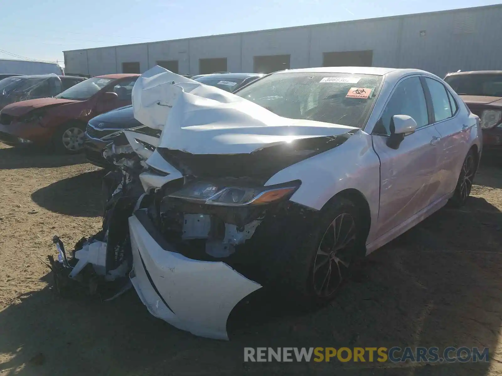 2 Photograph of a damaged car 4T1B11HK9KU804497 TOYOTA CAMRY 2019