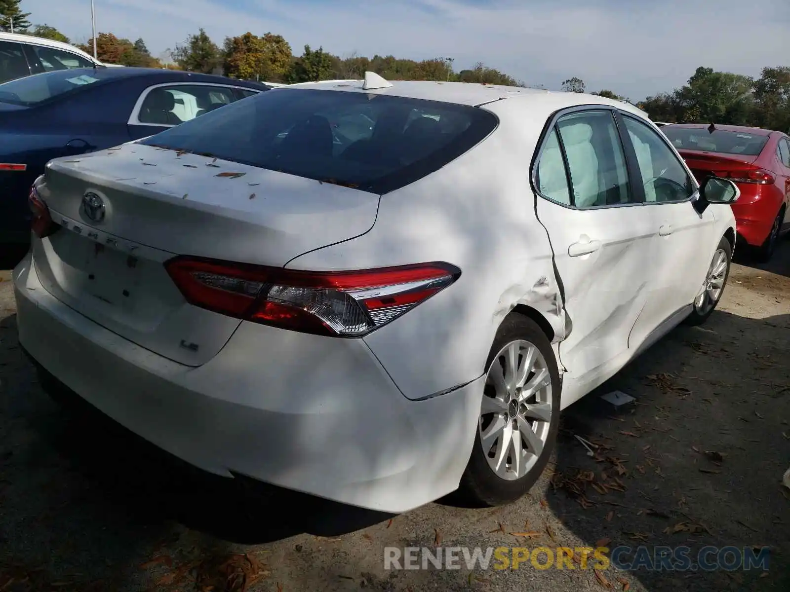 4 Photograph of a damaged car 4T1B11HK9KU805035 TOYOTA CAMRY 2019