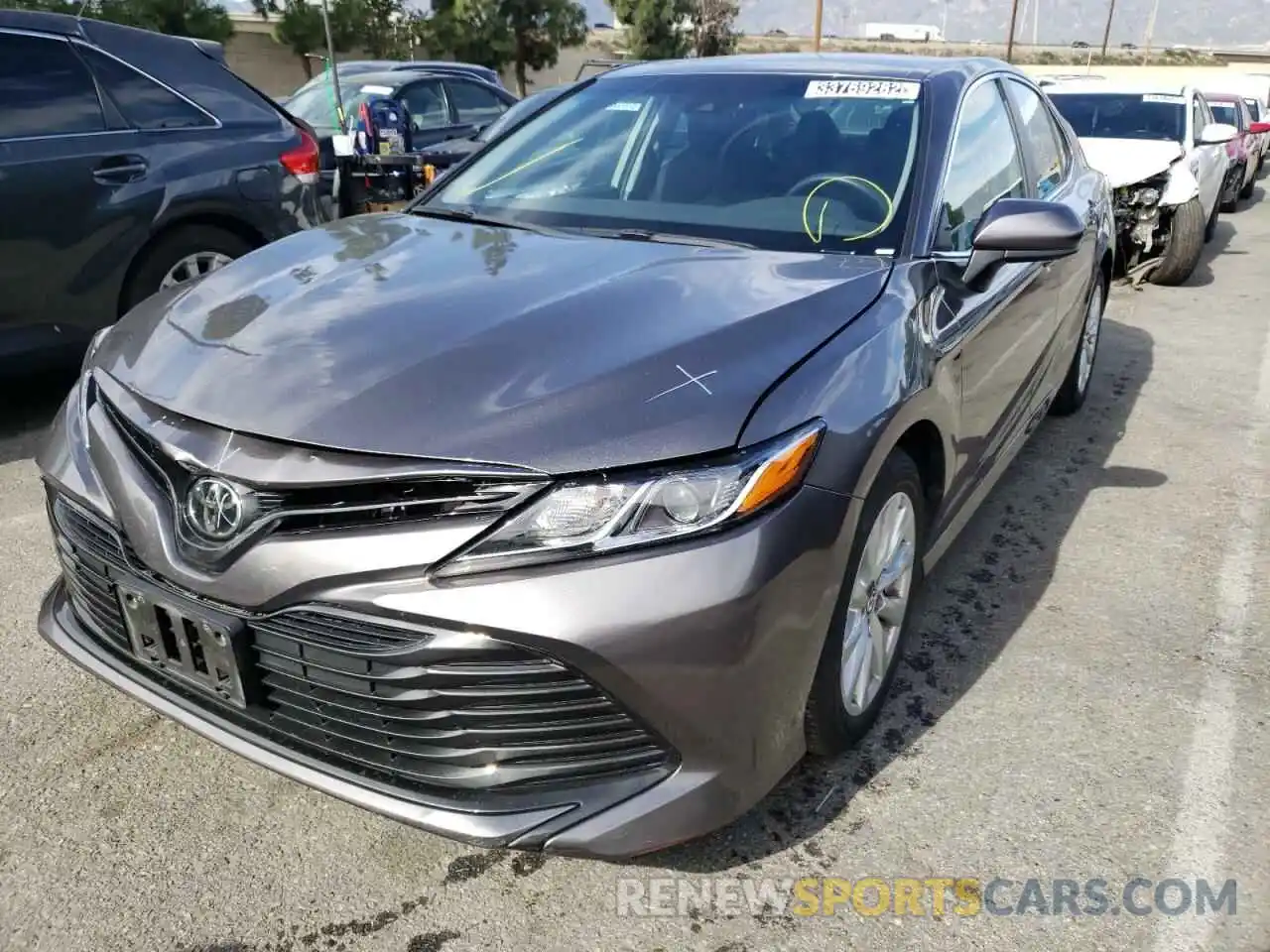 2 Photograph of a damaged car 4T1B11HK9KU805813 TOYOTA CAMRY 2019