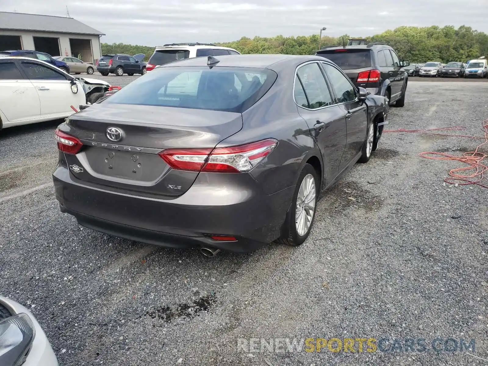 4 Photograph of a damaged car 4T1B11HK9KU809165 TOYOTA CAMRY 2019