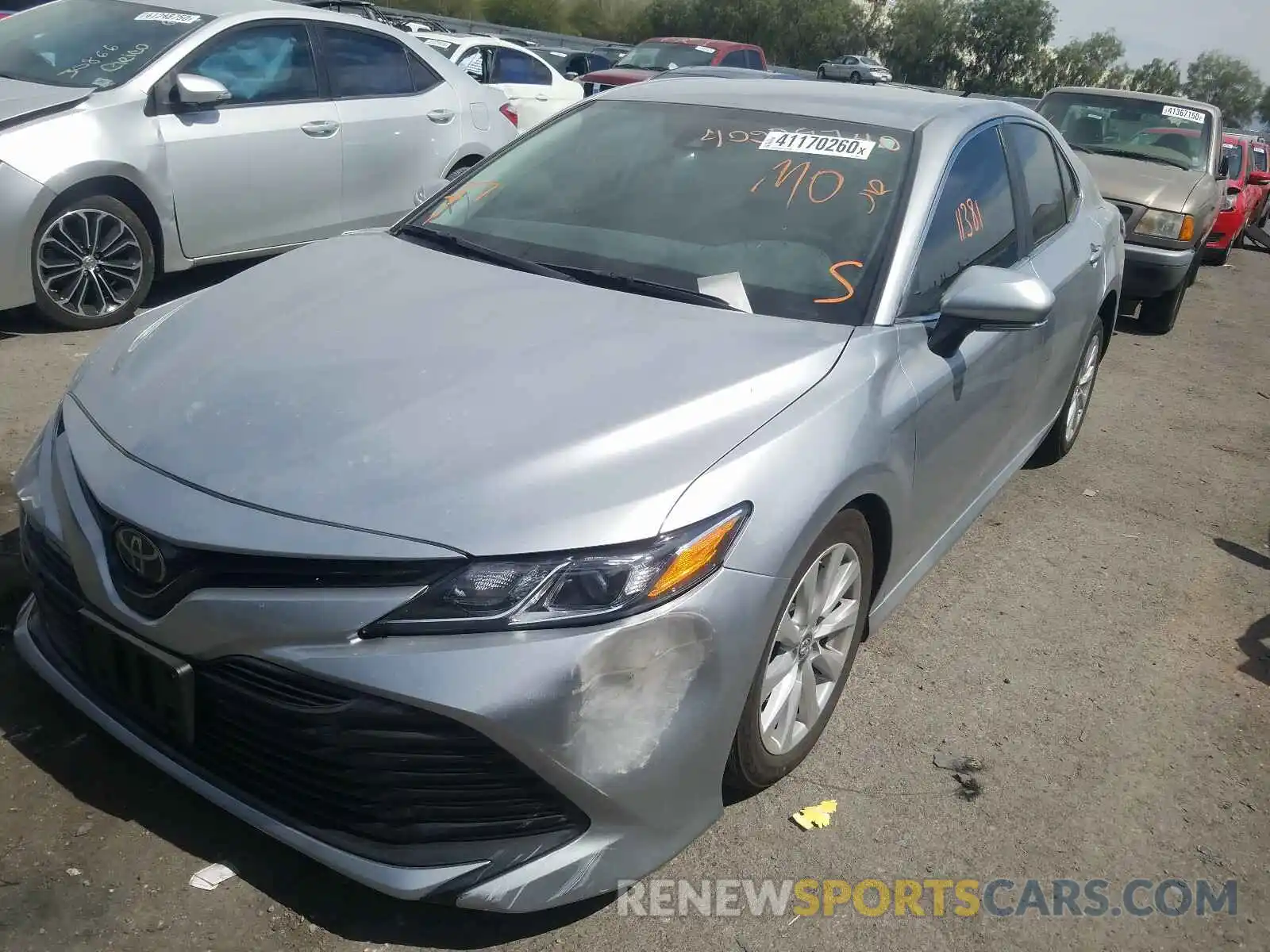 2 Photograph of a damaged car 4T1B11HK9KU810834 TOYOTA CAMRY 2019