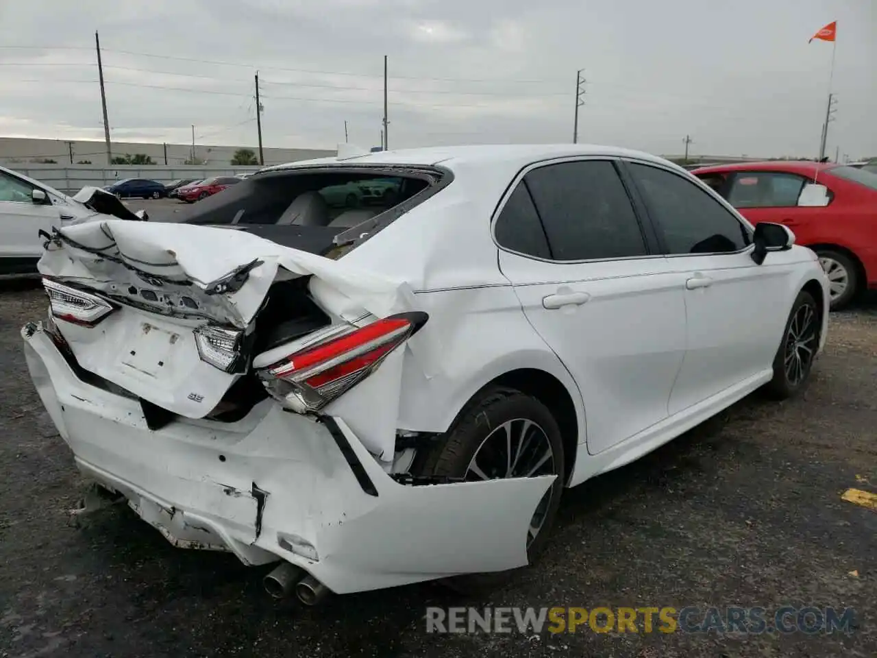 4 Photograph of a damaged car 4T1B11HK9KU810865 TOYOTA CAMRY 2019