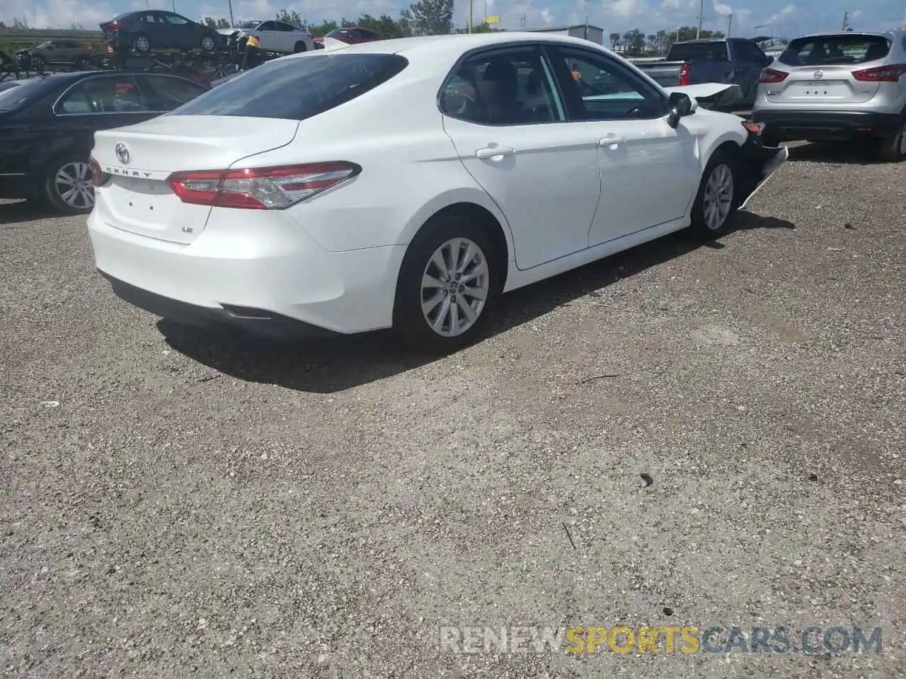 4 Photograph of a damaged car 4T1B11HK9KU812938 TOYOTA CAMRY 2019