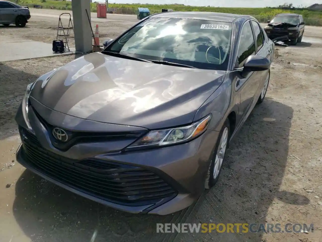 2 Photograph of a damaged car 4T1B11HK9KU812986 TOYOTA CAMRY 2019