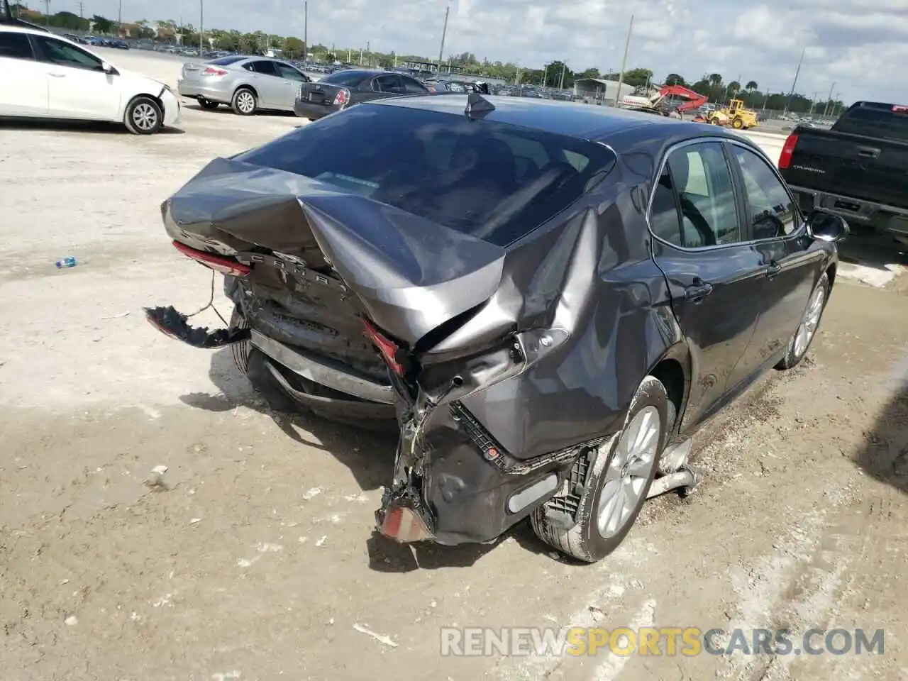 4 Photograph of a damaged car 4T1B11HK9KU812986 TOYOTA CAMRY 2019