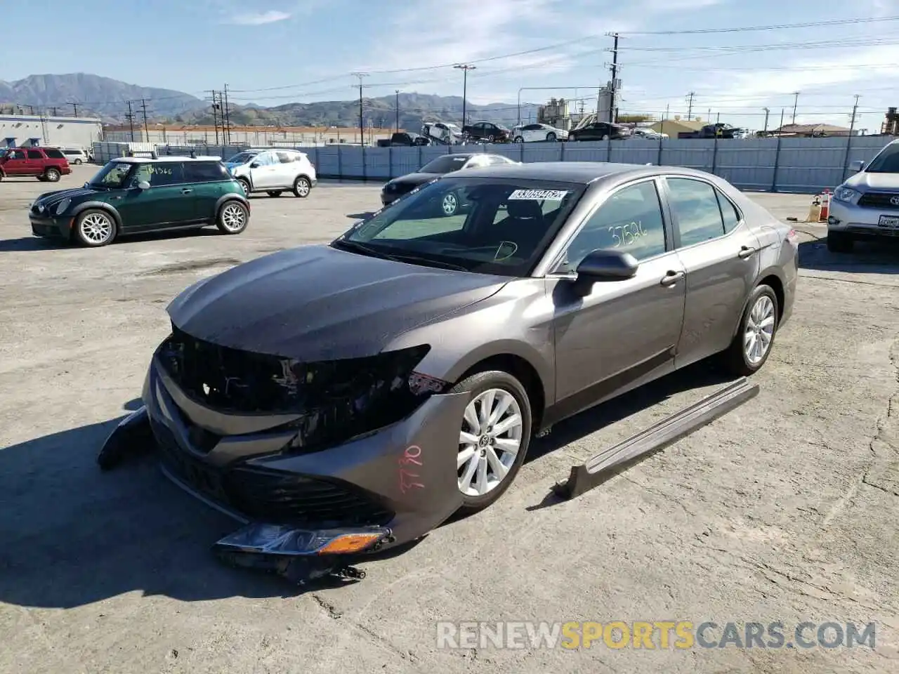 2 Photograph of a damaged car 4T1B11HK9KU813278 TOYOTA CAMRY 2019