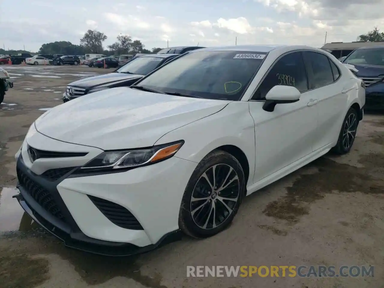 2 Photograph of a damaged car 4T1B11HK9KU815323 TOYOTA CAMRY 2019