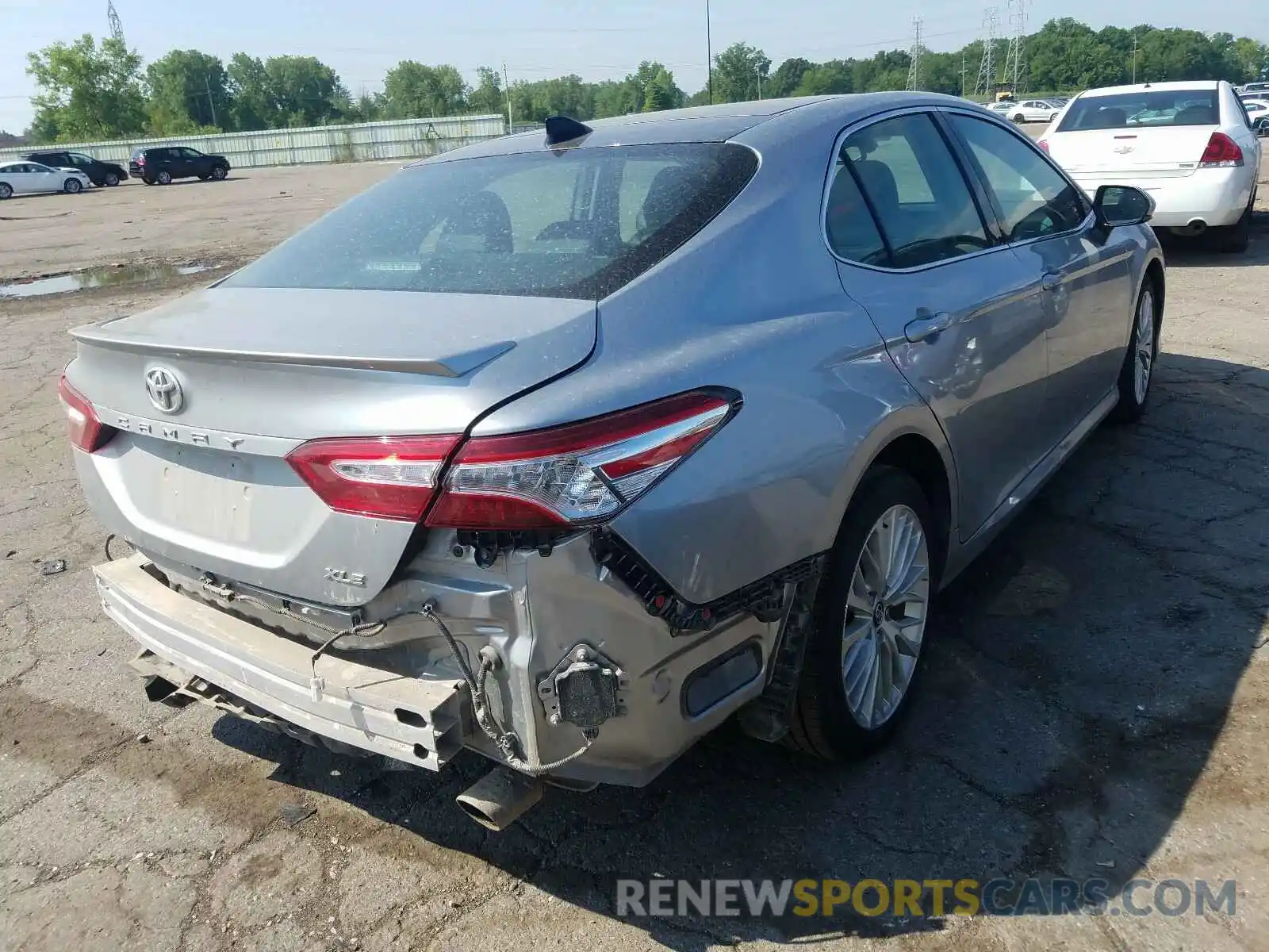 4 Photograph of a damaged car 4T1B11HK9KU815449 TOYOTA CAMRY 2019