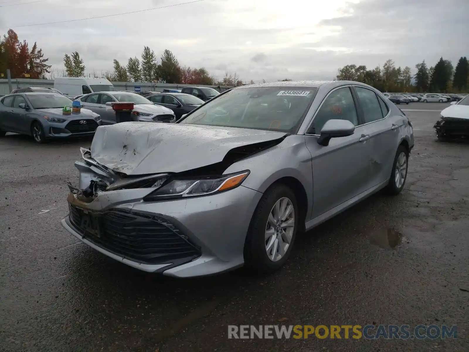 2 Photograph of a damaged car 4T1B11HK9KU816150 TOYOTA CAMRY 2019