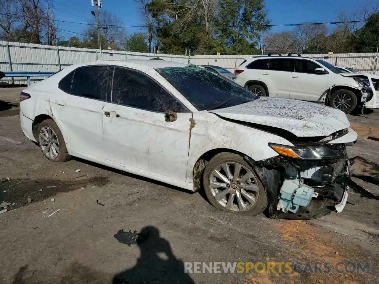 4 Photograph of a damaged car 4T1B11HK9KU817461 TOYOTA CAMRY 2019