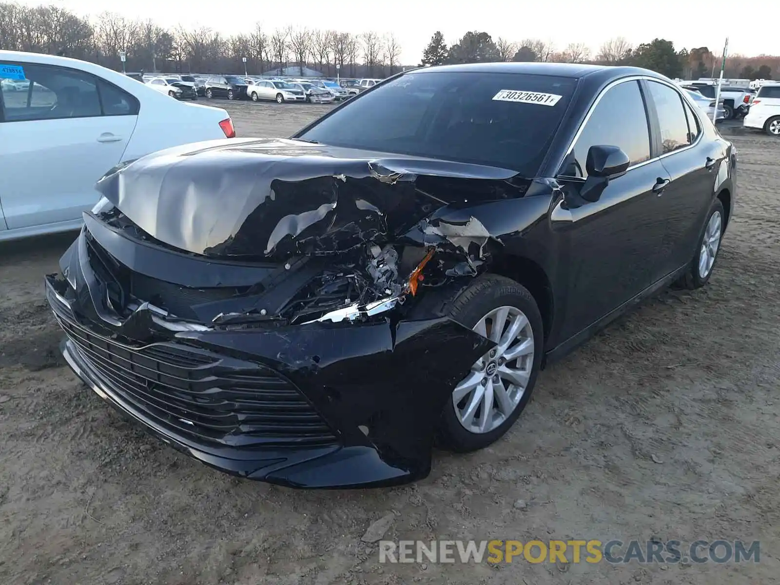 2 Photograph of a damaged car 4T1B11HK9KU821199 TOYOTA CAMRY 2019