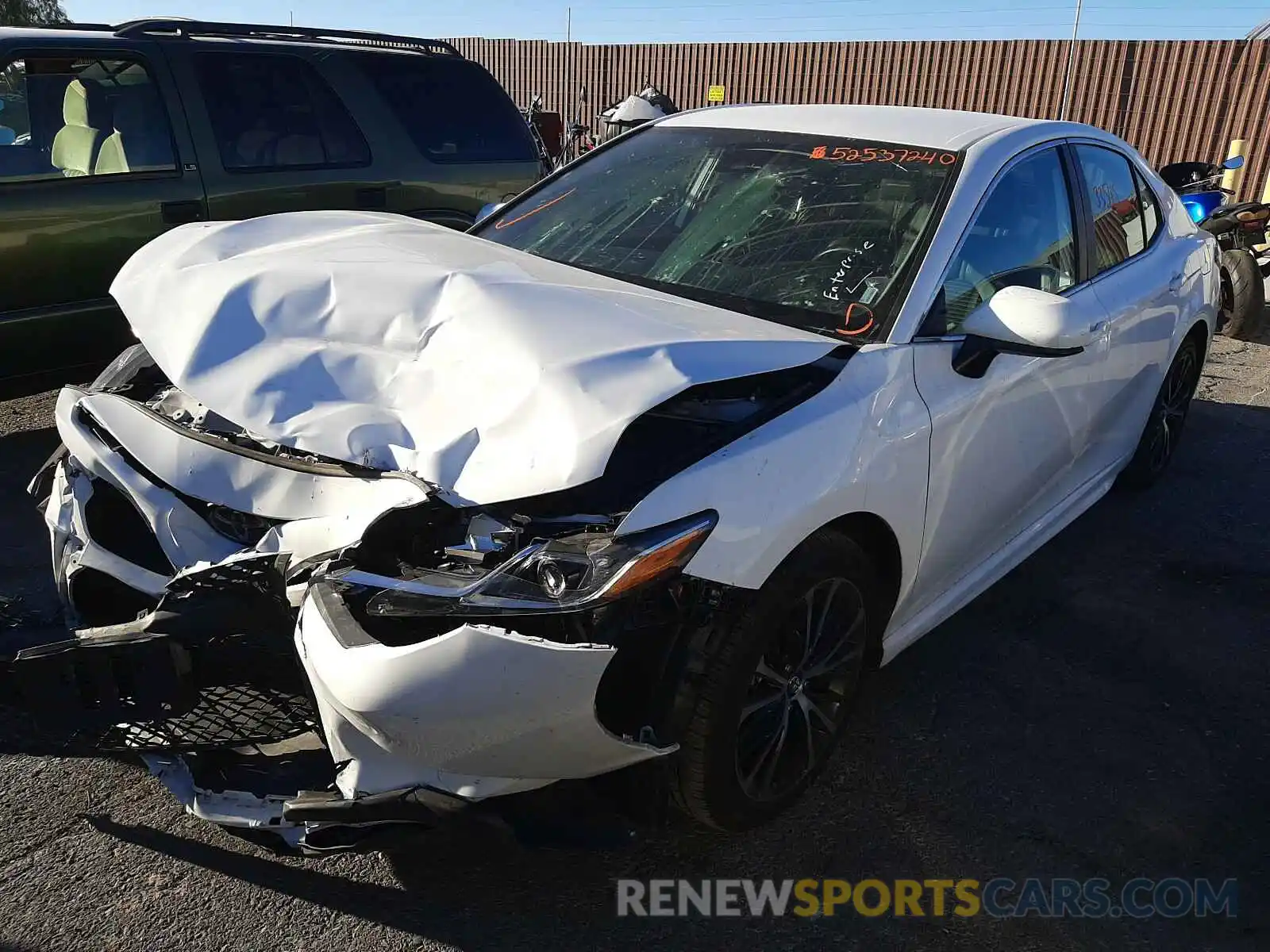 2 Photograph of a damaged car 4T1B11HK9KU822692 TOYOTA CAMRY 2019