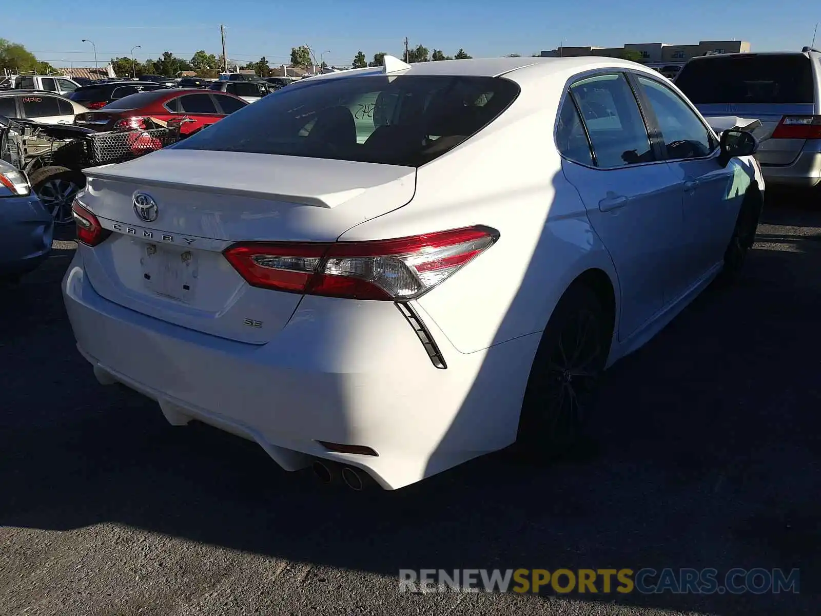 4 Photograph of a damaged car 4T1B11HK9KU822692 TOYOTA CAMRY 2019