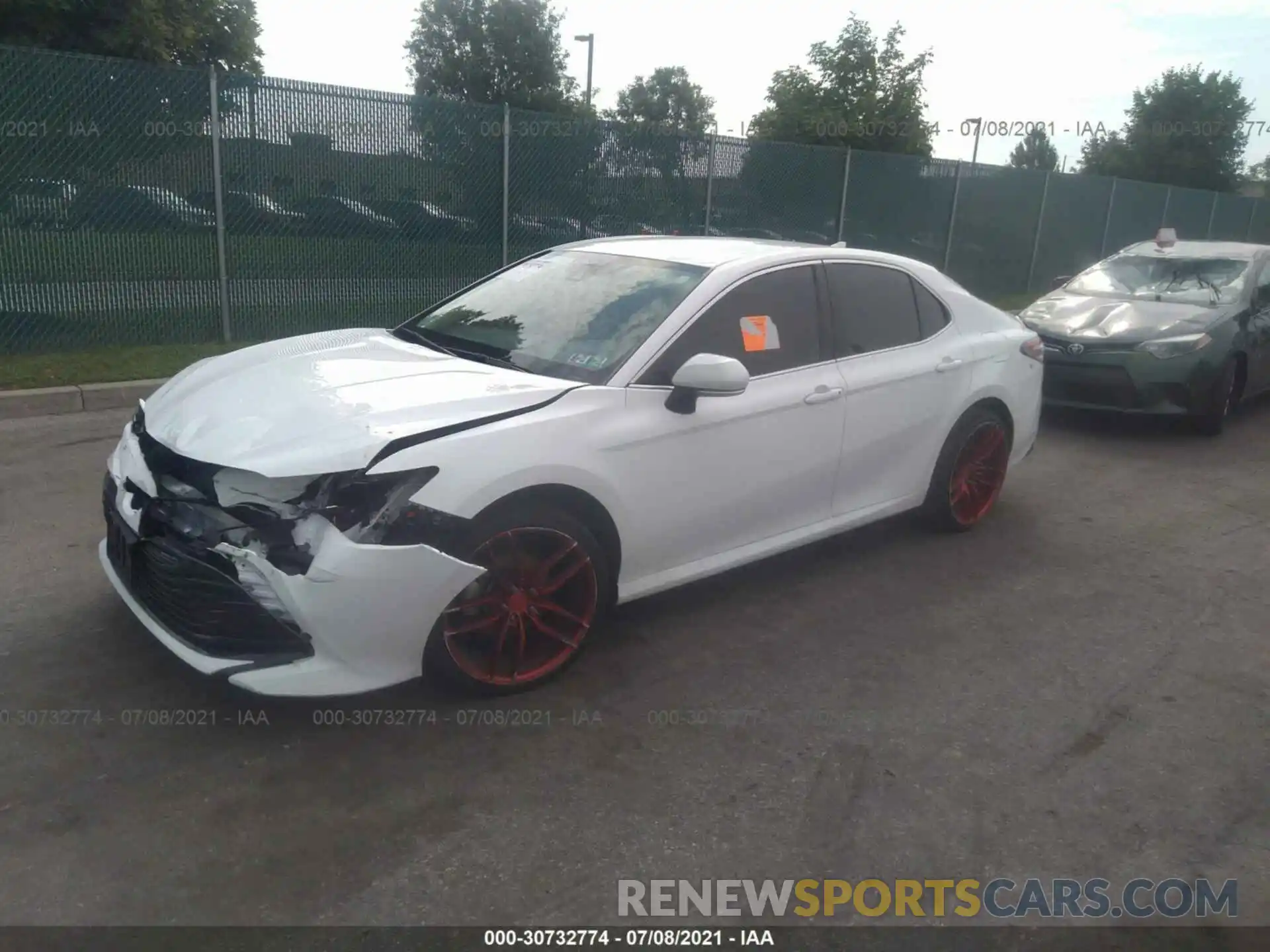 2 Photograph of a damaged car 4T1B11HK9KU828024 TOYOTA CAMRY 2019