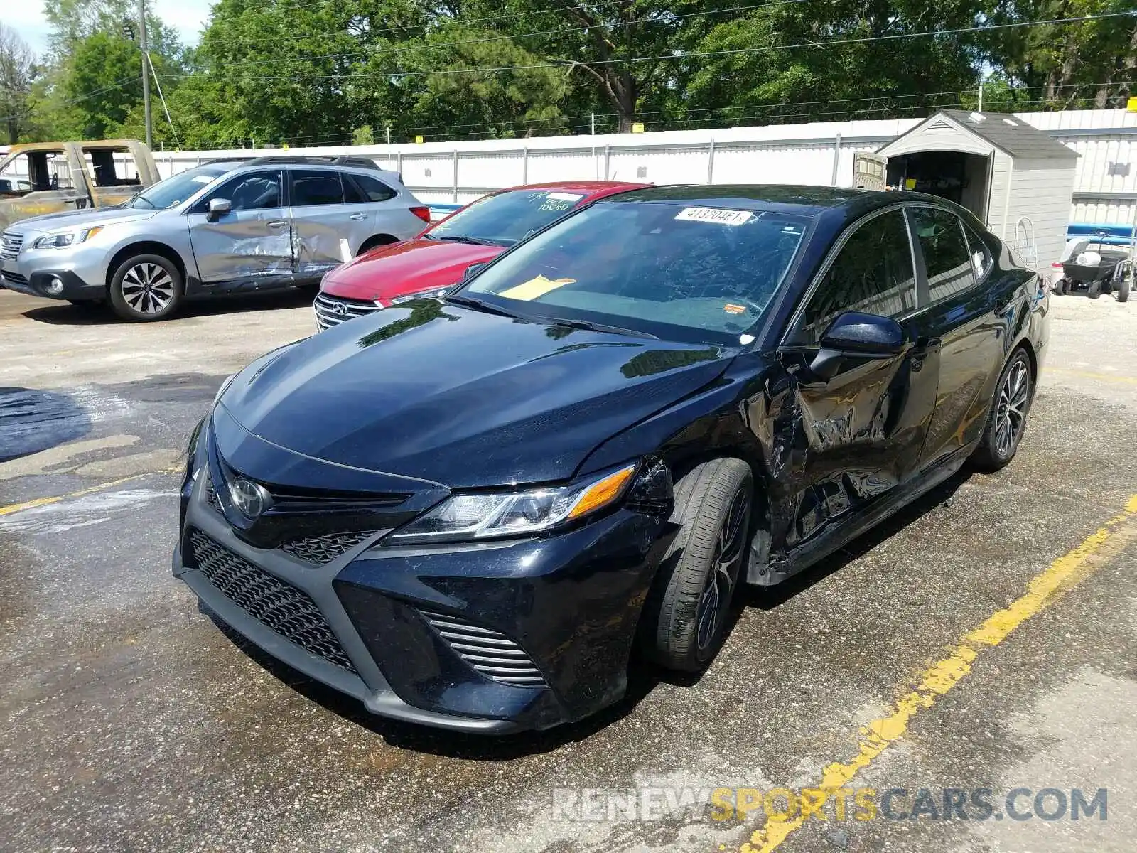 2 Photograph of a damaged car 4T1B11HK9KU828069 TOYOTA CAMRY 2019