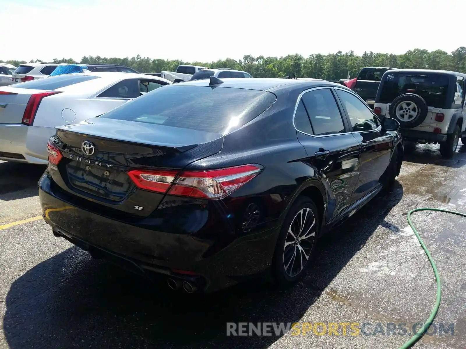 4 Photograph of a damaged car 4T1B11HK9KU828069 TOYOTA CAMRY 2019