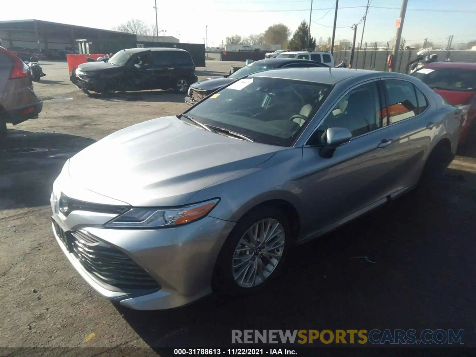 2 Photograph of a damaged car 4T1B11HK9KU828086 TOYOTA CAMRY 2019