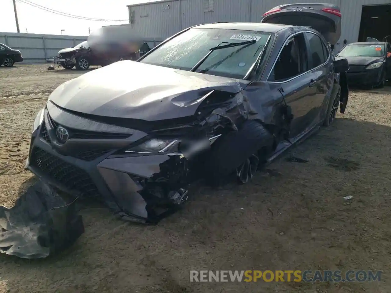 2 Photograph of a damaged car 4T1B11HKXKU165594 TOYOTA CAMRY 2019